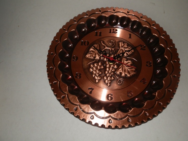 Orologio in rame diametro 25 cm rappresentante della frutta