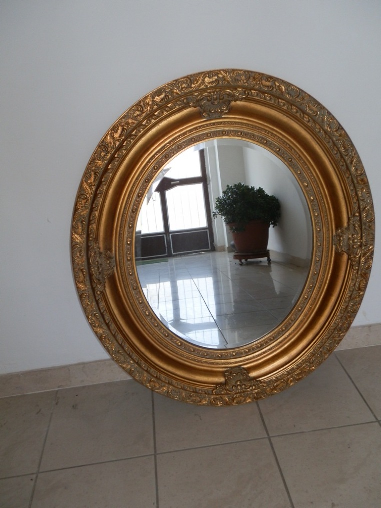 Specchio ovale in legno foglia oro