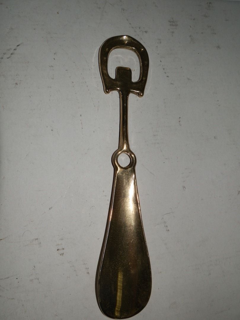 Oggettistica Calzascarpe in ottone lucido con ferro di cavallo