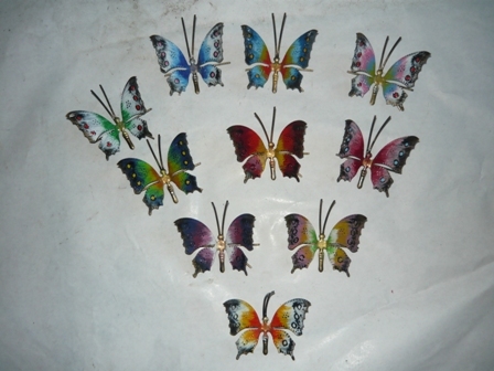 Serie di dieci farfalle piccole in ferro