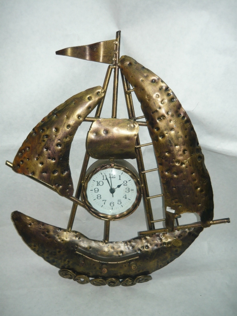 Orologio forma di barca in ferro battuto da parete